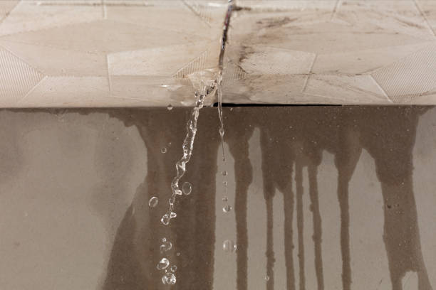 Professional Sewage Cleanup technician working in Amherst, MA